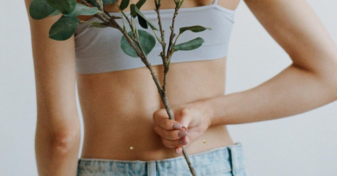 Back dimple piercings Back dimple piercings